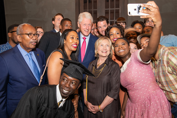 The Clintons take a selfie with the cast of Little Rock.