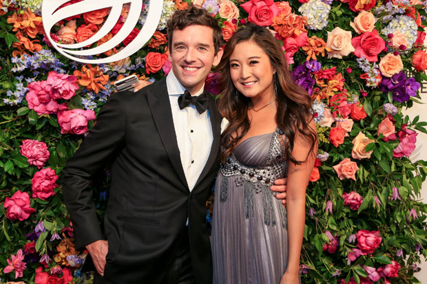 Michael Urie and Ashley Park walk the red carpet at the American Theatre Wing gala, honoring Andrew Lloyd Webber.