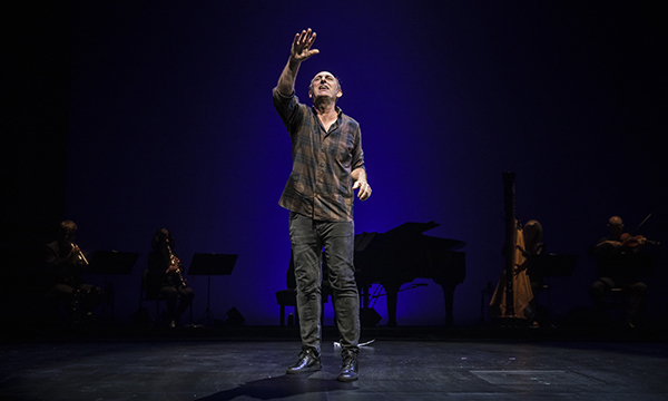 Playwright and performer David Cale in the world premiere of his solo musical memoir We're Only Alive for A Short Amount of Time, directed by Robert Falls, at the Goodman Theatre.