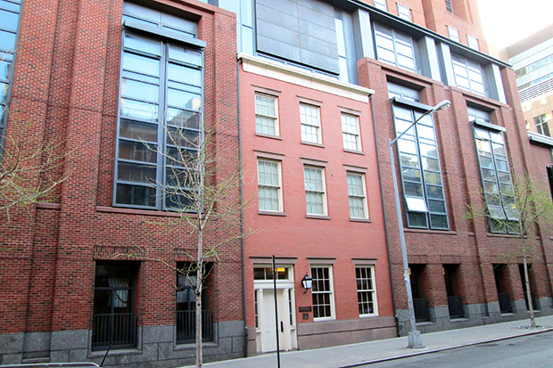 The facade of Poe&#39;s former residence at 85 Amity Street is now entombed within NYU&#39;s Furman Hall on West Third Street.