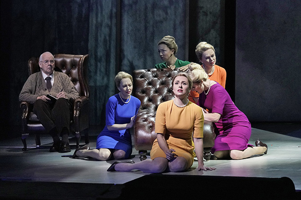 James Courtney plays a psychologist, Isabel Leonard (foreground) plays the title role, and Dísella Lárusdóttir (in blue), Peabody Southwell (green), Deanna Breiwick, (orange), and Rebecca Ringle Kamarei (magenta) play the Shadow Marnies in Nico Muhly and Nicholas Wright&#39;s Marnie, directed by Michael Mayer, at the Metropolitan Opera.