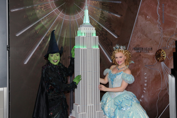 Jessica Vosk and Amanda Jane Cooper light the Empire State Building emerald green.
