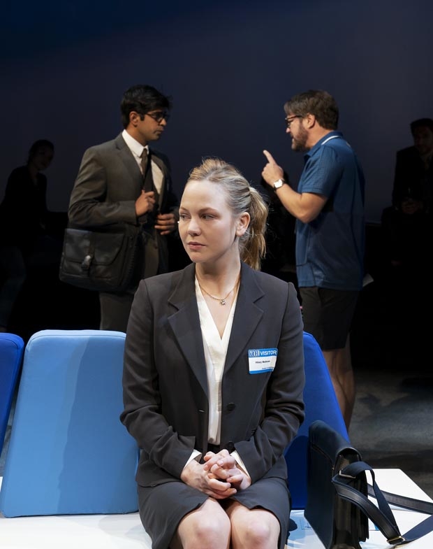 Adelaide Clemens (center) listens in on Eshan Bajpay and Robert Petkoff.
