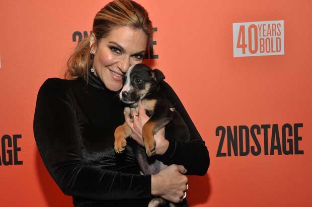 Shoshanna Bean cuddles with a puppy at Second Stage Theater&#39;s fall benefit.