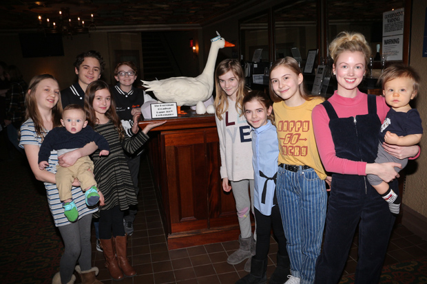 The kids of The Ferryman with their 100th performance cake.