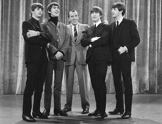Ed Sullivan brought the Beatles into American homes through a series of live television broadcasts.