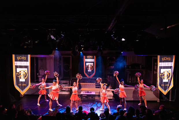 The cast of We Are the Tigers performs a cheer at Theatre 80 St. Marks.