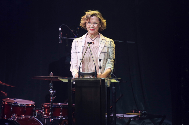 All My Sons star Annette Bening presents an award at the Roundabout Theatre Company gala.