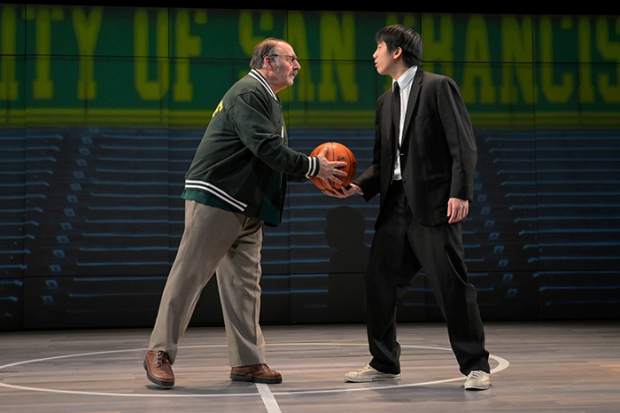 Tim Liu as Manford in a scene with Arye Gross as Coach Saul. 