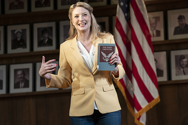 Heidi Schreck holds a copy of Your Rugged Constitution in What the Constitution Means to Me.
