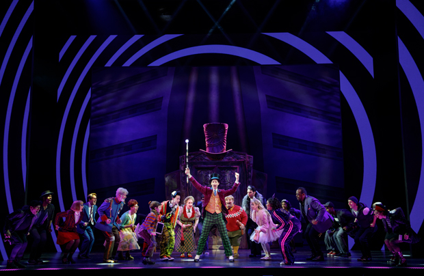 Noah Weisberg and the company of Charlie and the Chocolate Factory.