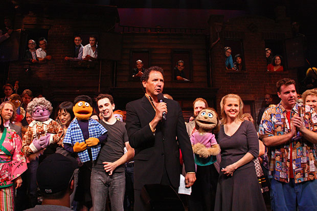 Princeton and Rob McClure, and Kate and Anika Larsen look on as Avenue Q producer Kevin McCollum announces that the show wasn&#39;t closing after all. 