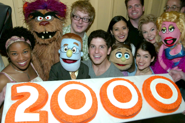 The cast of the Avenue Q celebrate their 2000th performance in 2008.
