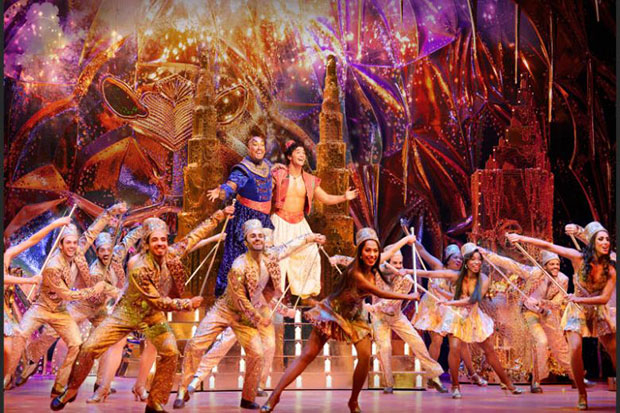 Michael James Scott and Ainsley Melham currently play the Genie and Aladdin, respectively, in Aladdin on Broadway.