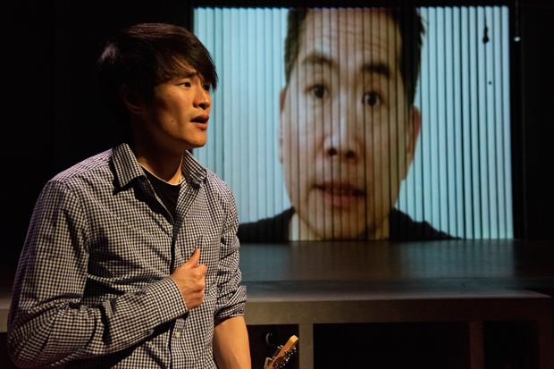 Christopher Larkin (foreground) takes an overseas Skype call from Andrew Pang (background) in Nomad Motel.