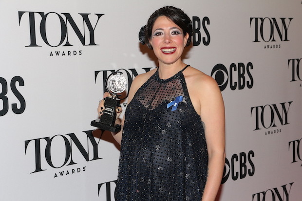 Director Rachel Chavkin proudly holds her first Tony Award.