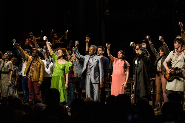 The Hadestown cast and creators raise their cups at curtain call after the June 11 performance.