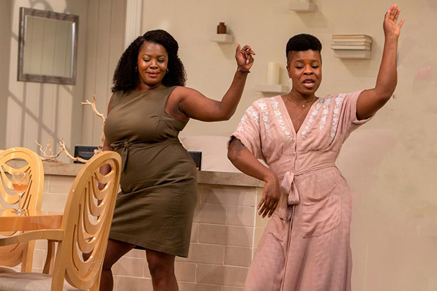 Beverly (Heather Alicia Simms) and Jasmine (Roslyn Ruff) dance in Fairview.