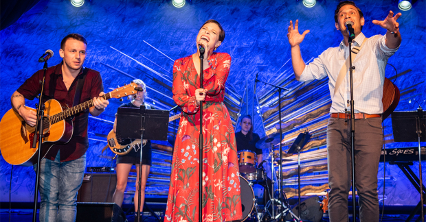 Gerard Canonico, Lauren Marcus, and Eric William Morris onstage.