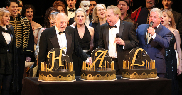 Harold Prince celebrates his 90th birthday in 2018 with Andrew Lloyd Webber, Cameron Mackintosh, and the cast of The Phantom of the Opera.