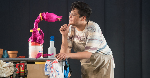 Audrey II and George Salazar in Little Shop of Horrors.