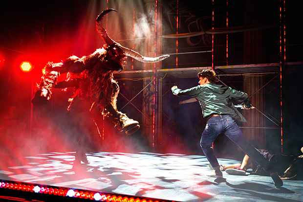 Percy Jackson (Chris McCarrell) fights a Minotaur.