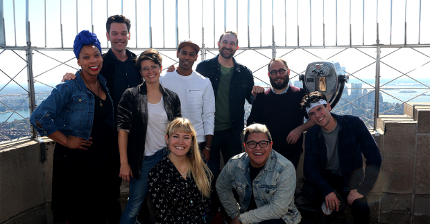 The cast and creative team of The Lightning Thief atop the Empire State Building.