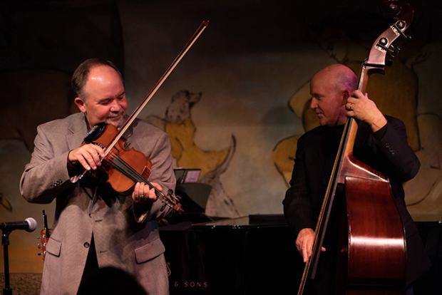 Tim and Dennis Crouch accompany Winningham on fiddle and bass.