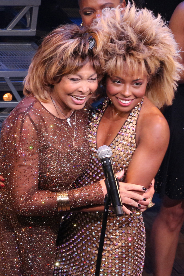 Tina Turner on stage with Adrienne Warren after Tina: The Tina Turner Musical.