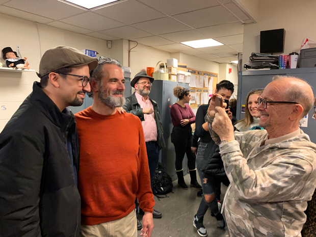 Yiddish Fiddler on the Roof director Joel Grey snaps a photo of Lin-Manuel Miranda and star Steven Skybell backstage.