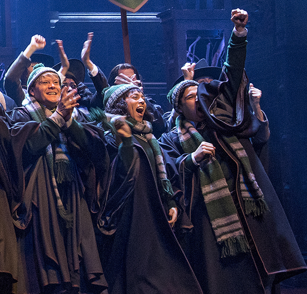 Sarita Amani Nash (center) as a Slytherin student in a scene from Harry Potter and the Cursed Child on Broadway.