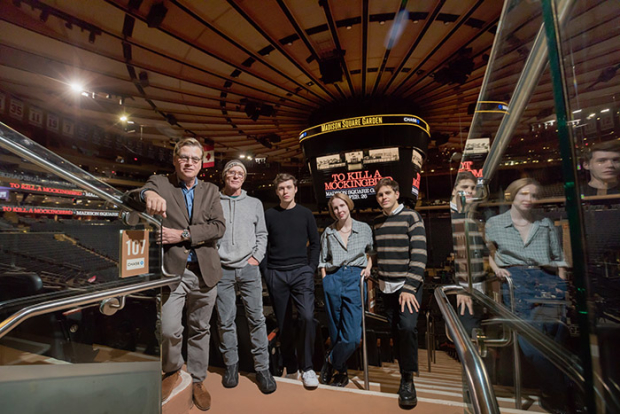 Aaron Sorkin, Ed Harris, Nick Robinson, Nina Grollman, and Taylor Trensch stand in Madison Square Garden, where To Kill a Mockingbird will perform on February 26, 2020.