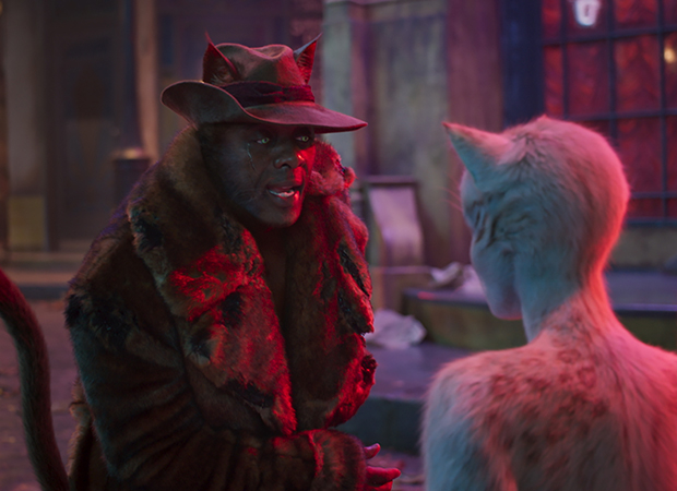 Idris Elba as Macavity, with Francesca Heyward as Victoria.