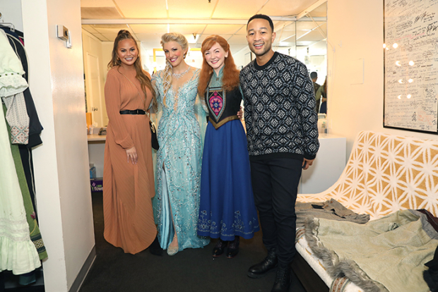 Chrissy Teigen, Caroline Bowman (Elsa), Caroline Innerbichler (Anna), and John Legend after a performance of Frozen at the Hollywood Pantages Theatre.