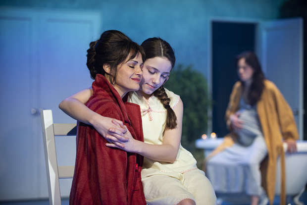 Carla Gugino as Carol, Ava Briglia as young Anna, and Celeste Arias as adult Anna in Alice Birch&#39;s Anatomy of a Suicide, directed by Lileana Blain-Cruz, at the Linda Gross Theater. 