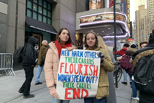 Paige Levy and Megan Rabin protest outside the Broadway Theatre on the opening night of West Side Story.