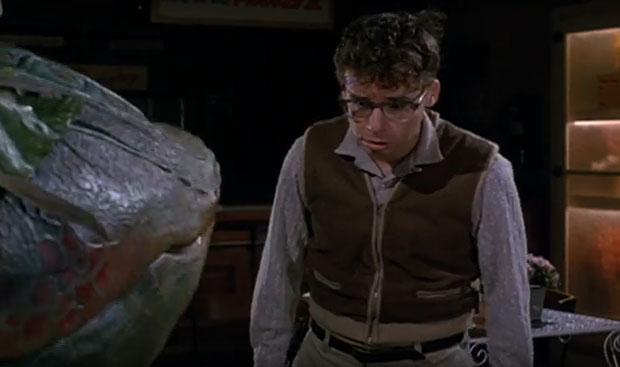 Rick Moranis and Audrey II in Frank Oz&#39;s 1986 film adaptation of Little Shop of Horrors.