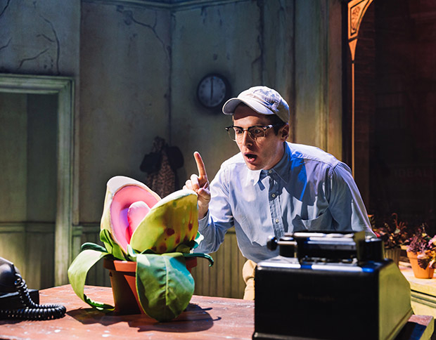 Jonathan Groff and Audrey II in Little Shop of Horrors.