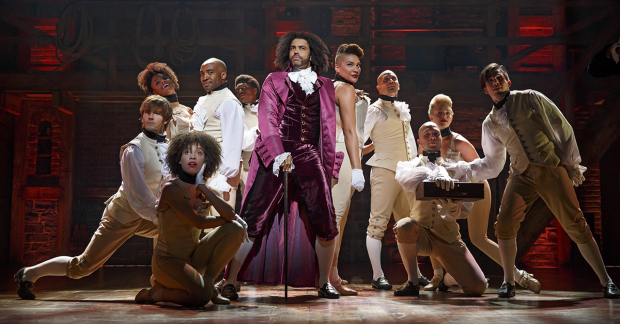 Cast members from the Broadway production of Hamilton. If you know the name of the actor in purple, you have an answer to one of this puzzle&#39;s clues.
