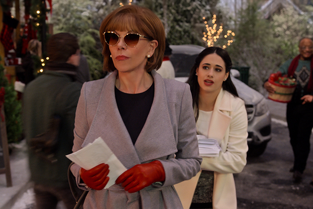 Christine Baranski plays Regina Fuller, and Jeanine Mason plays her assistant Felicity in Christmas on the Square.