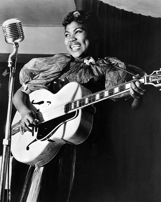 Sister Rosetta Tharpe performs onstage with the Lucky Millinder Orchestra in circa 1938. 