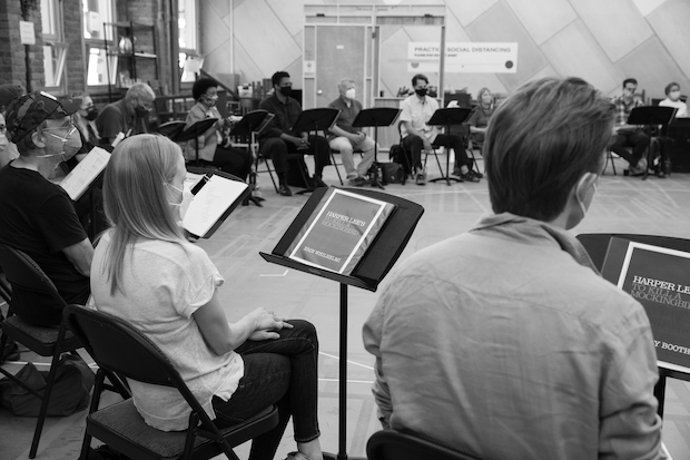 Actors in To Kill a Mockingbird sit down to read the play on the first day of rehearsal. 