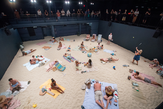 Audiences observe Sun &amp; Sea from a mezzanine around the theater.