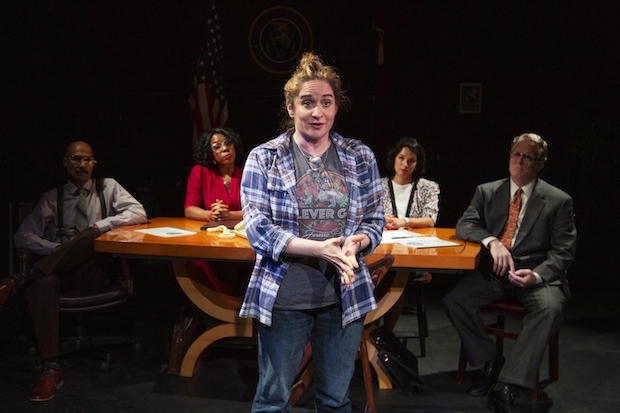 Alix Sobler (front) portrays the Playwright in her play Hindsight.