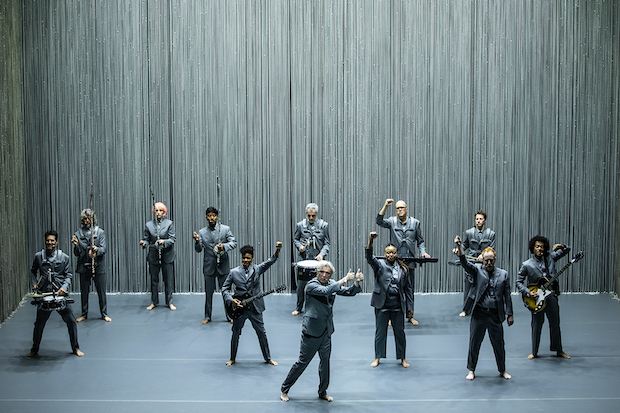 The cast of David Byrne&#39;s American Utopia wears gray suits.