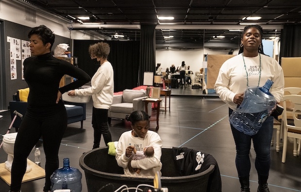 The cast and crew of Cullud Wattah rehearse at the Public Theater. 