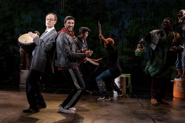 David Hyde Pierce and Ahmad Maksoud (foreground) star in the world premiere of Tom Kitt, Brian Yorkey, and Kwame Kwei-Armah&#39;s The Visitor, directed by Daniel Sullivan, at the Public Theater.