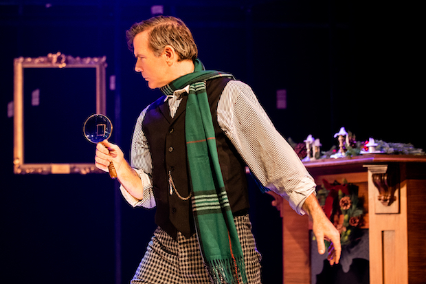 Drew McVety stars as Sherlock Holmes in A Sherlock Carol, written and directed by Mark Shanahan, at New World Stages. 
