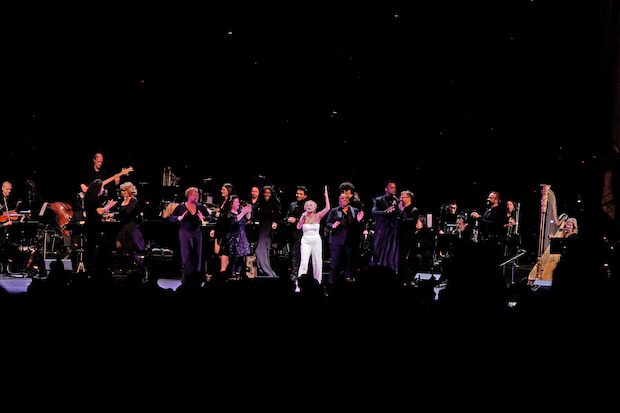 Kristin Chenoweth performs with the backup singers and orchestra of her holiday concert, Christmas at the Met.