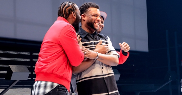Luke James and understudy Bjorn DuPaty embrace Thoughts of a Colored Man playwright Keenan Scott II (center) after the December 21 performance. 